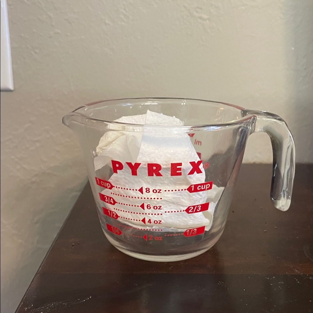 Pyrex Clear Measuring Cup with Red Markings (one cup).